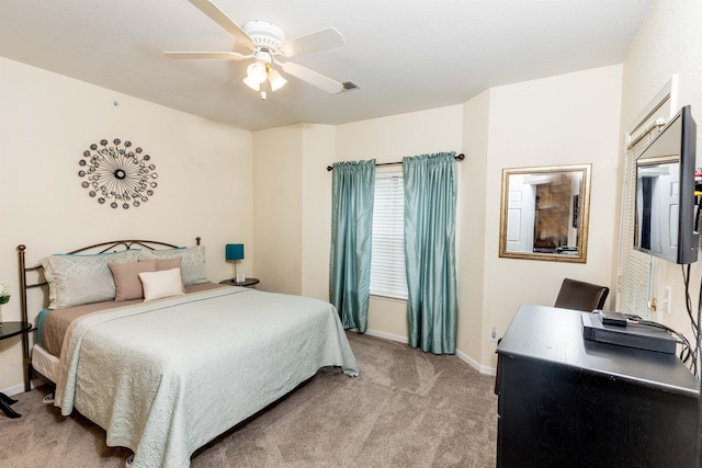 813 Holiday Rdg Unit 6, Branson, MO 65616 - bedroom featuring a ceiling fan, baseboards, and light carpet