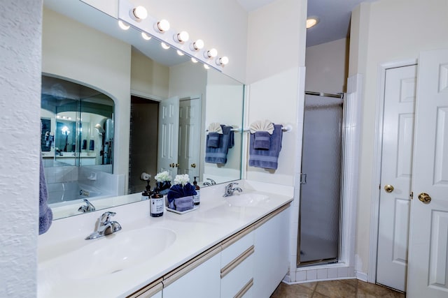 813 Holiday Rdg Unit 6, Branson, MO 65616 - bathroom featuring a sink, double vanity, and a stall shower