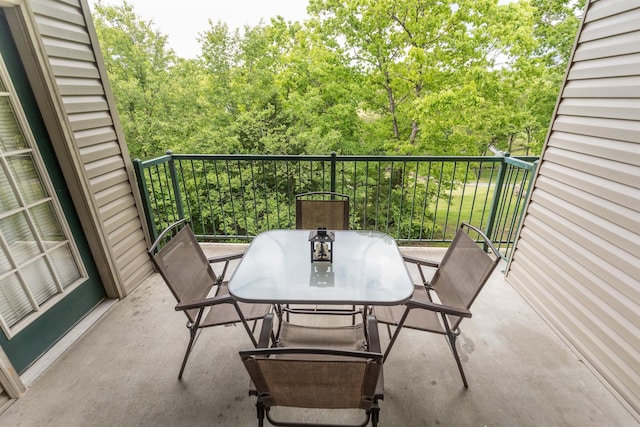 813 Holiday Rdg Unit 6, Branson, MO 65616 - balcony with outdoor dining area