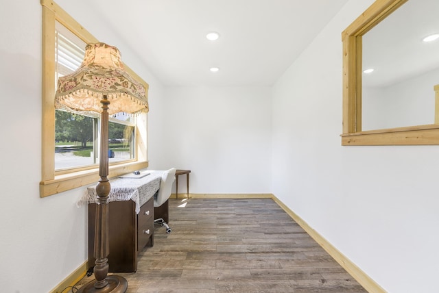 office area with wood-type flooring