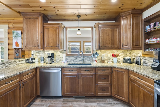 kitchen featuring dishwasher, tasteful backsplash, sink, and light stone counters