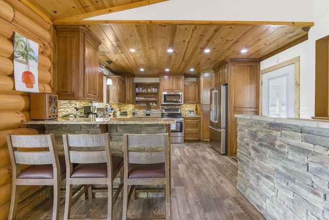 kitchen with decorative backsplash, dark hardwood / wood-style floors, stainless steel appliances, wooden ceiling, and kitchen peninsula