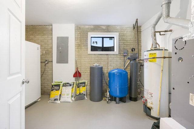 utility room with gas water heater and electric panel