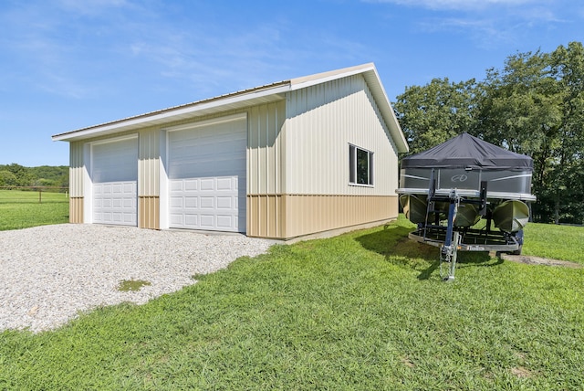 garage with a lawn