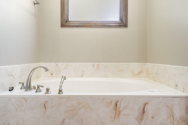 full bath with a garden tub