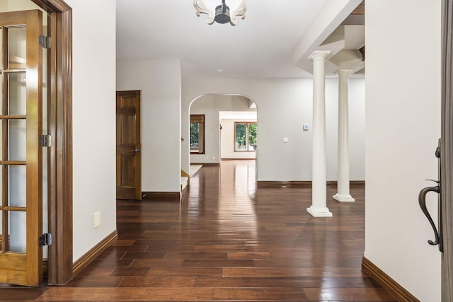 foyer with dark hardwood / wood-style floors