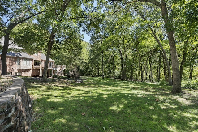 view of yard featuring a deck