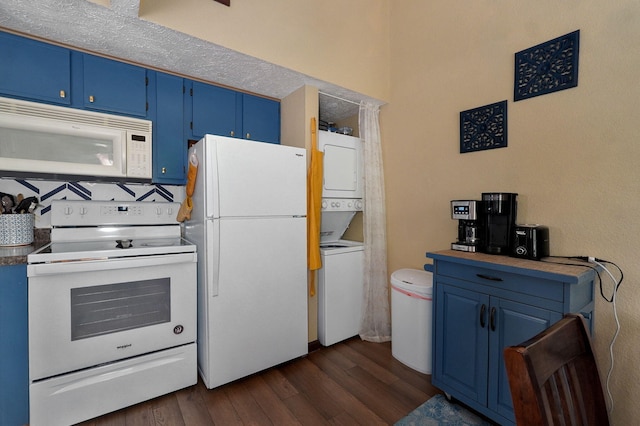 kitchen featuring white appliances, backsplash, stacked washing maching and dryer, blue cabinetry, and dark hardwood / wood-style floors