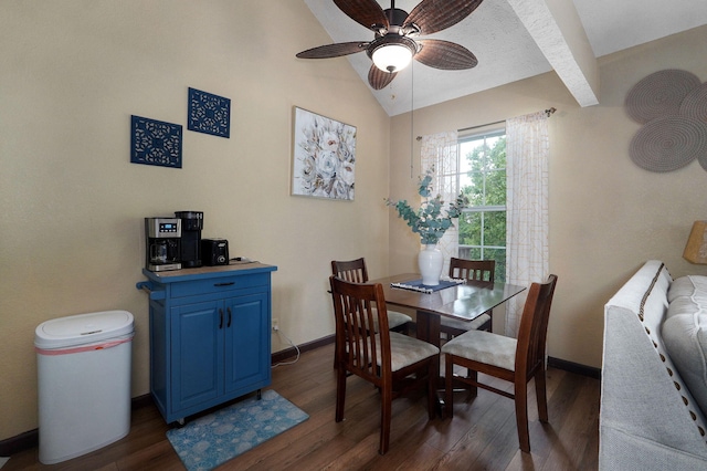 dining space featuring ceiling fan, lofted ceiling, and dark hardwood / wood-style floors