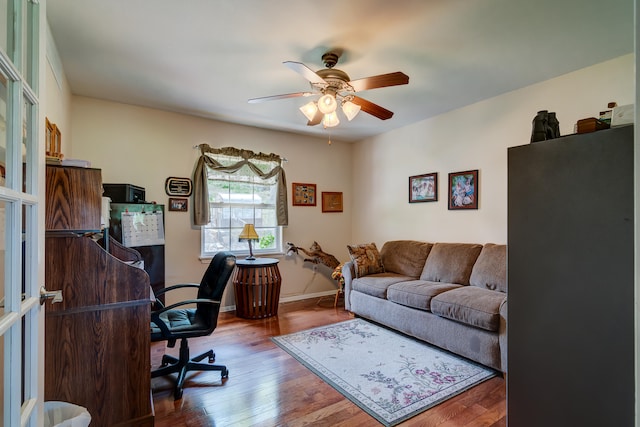 home office featuring ceiling fan and hardwood / wood-style floors