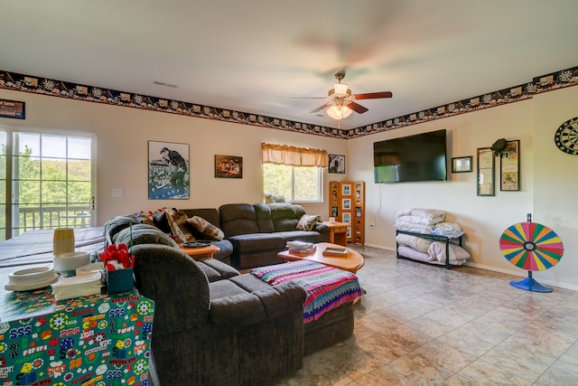 living room featuring ceiling fan