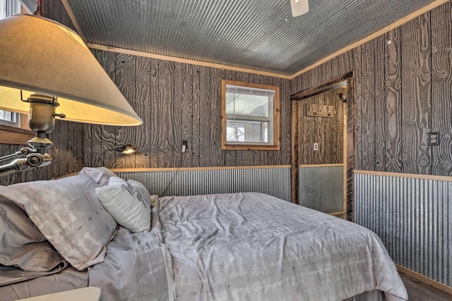 3142 Fishin Hole Rd, Flemington, MO 65650 - bedroom with wood finished floors and wood walls