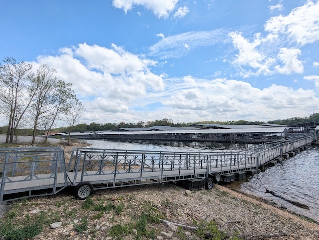 dock area featuring a water view