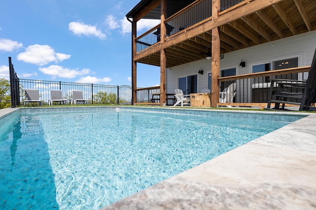 view of swimming pool featuring a patio