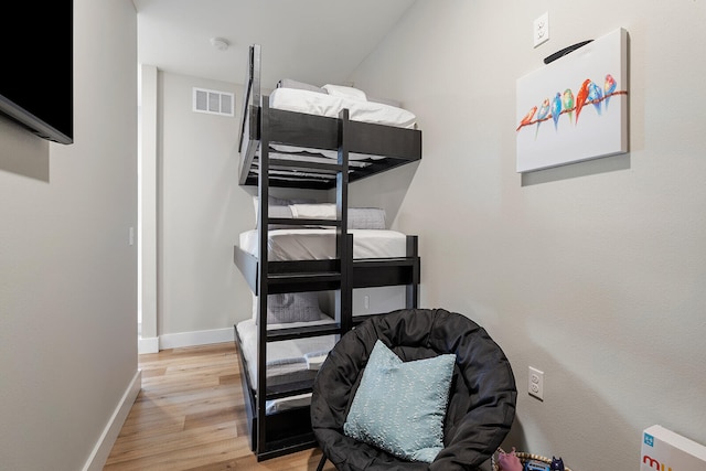 bedroom featuring light hardwood / wood-style floors