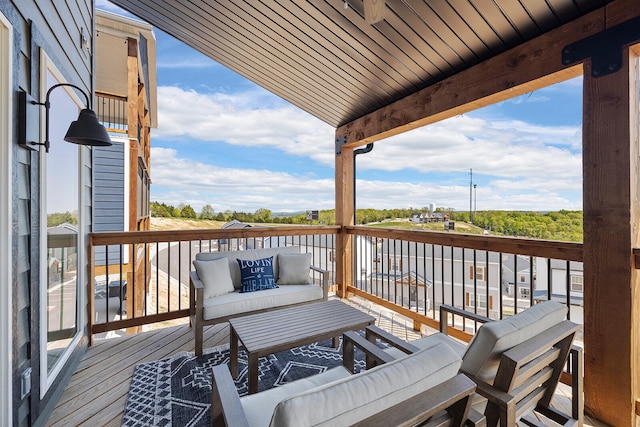 deck with an outdoor hangout area