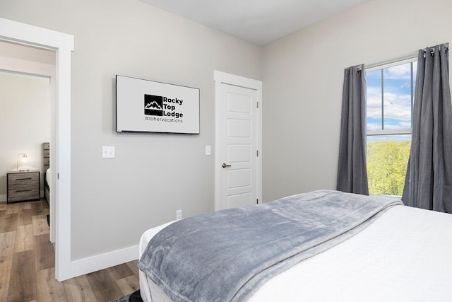 bedroom featuring hardwood / wood-style flooring