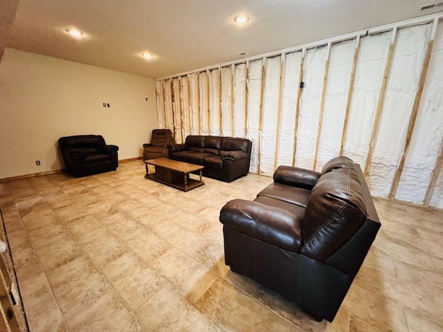 living area with recessed lighting