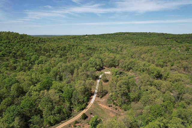bird's eye view featuring a view of trees