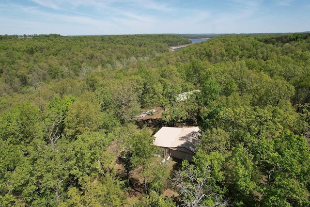 bird's eye view featuring a forest view