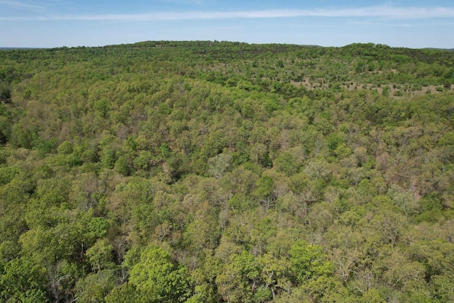aerial view featuring a view of trees