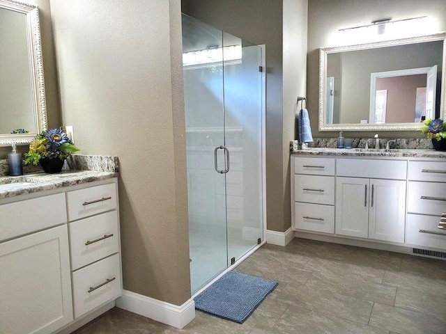 21942 Mill Creek Cir, Shell Knob, MO 65747 - full bath featuring baseboards, vanity, visible vents, and a stall shower