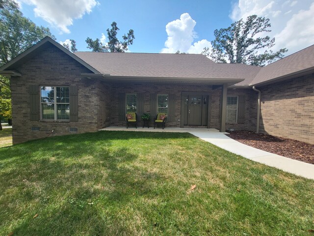 21942 Mill Creek Cir, Shell Knob, MO 65747 - view of front of home featuring brick siding and a front yard