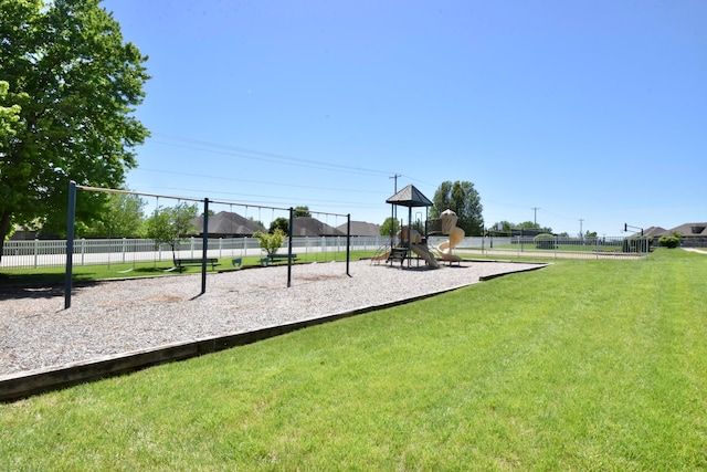 view of jungle gym with a yard