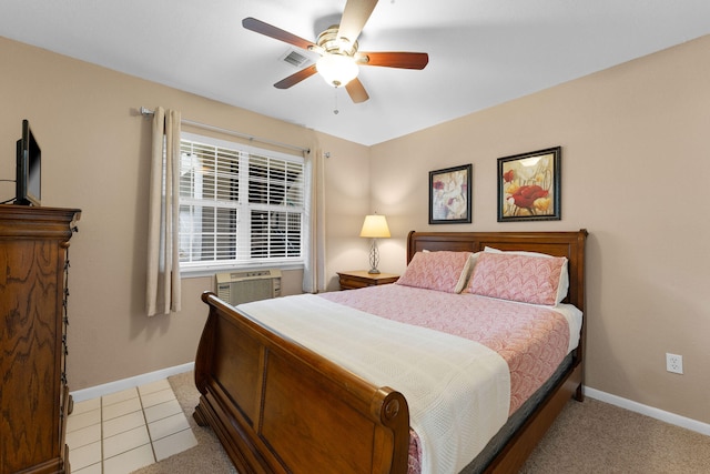 tiled bedroom with cooling unit and ceiling fan