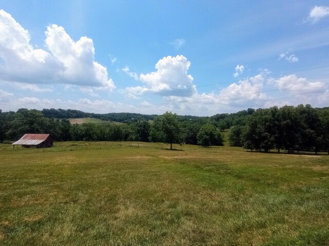 exterior space with a rural view