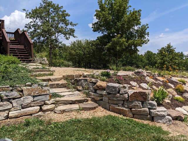 view of yard featuring an outdoor fire pit