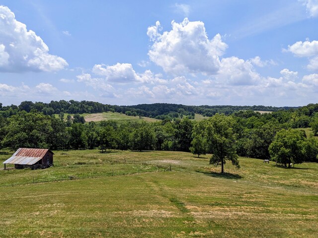 view of mountain feature with a rural view