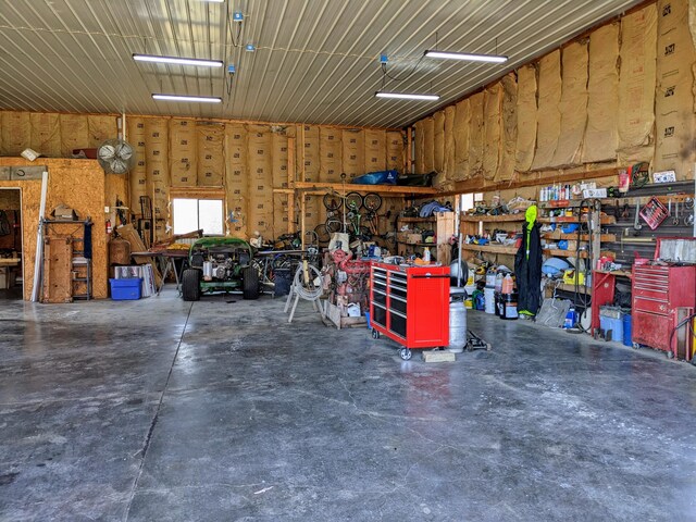 garage featuring a workshop area