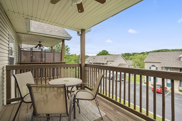 wooden deck with ceiling fan