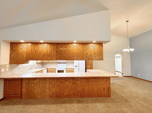 kitchen featuring a peninsula, light colored carpet, white appliances, light countertops, and high vaulted ceiling