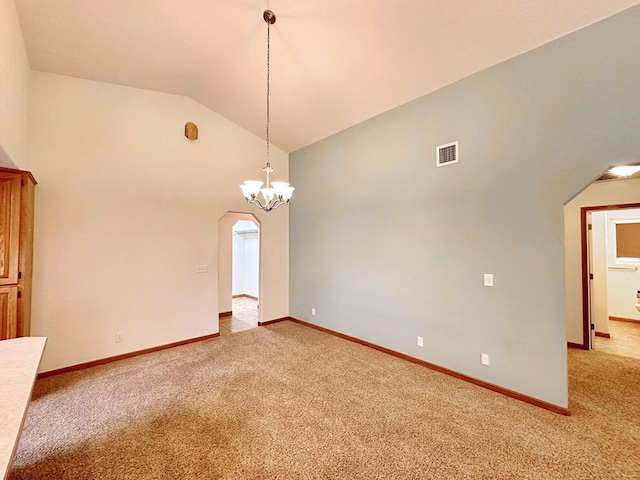 empty room with arched walkways, light carpet, baseboards, lofted ceiling, and visible vents