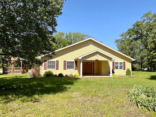 ranch-style house with a front lawn