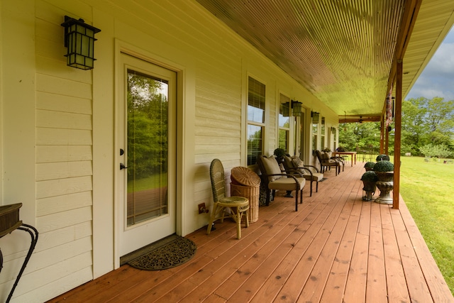 wooden deck featuring covered porch