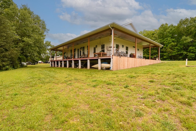 view of side of property with a lawn