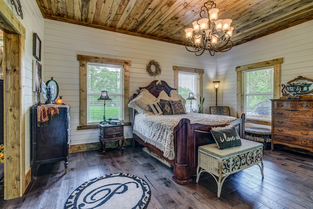 bedroom featuring wood ceiling, dark hardwood / wood-style floors, and multiple windows