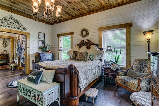 bedroom with a notable chandelier, multiple windows, wood ceiling, and dark hardwood / wood-style floors