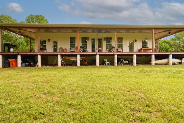 back of house with a yard