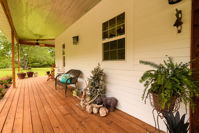 wooden terrace with ceiling fan