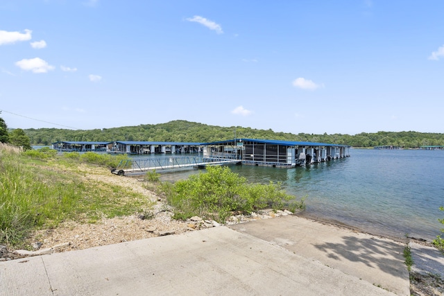 view of dock with a water view