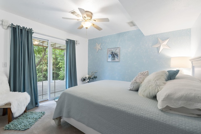 carpeted bedroom with ceiling fan and access to exterior