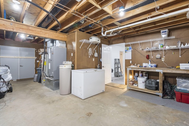 basement featuring a workshop area, refrigerator, and heating unit