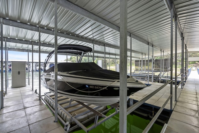 dock area featuring a water view