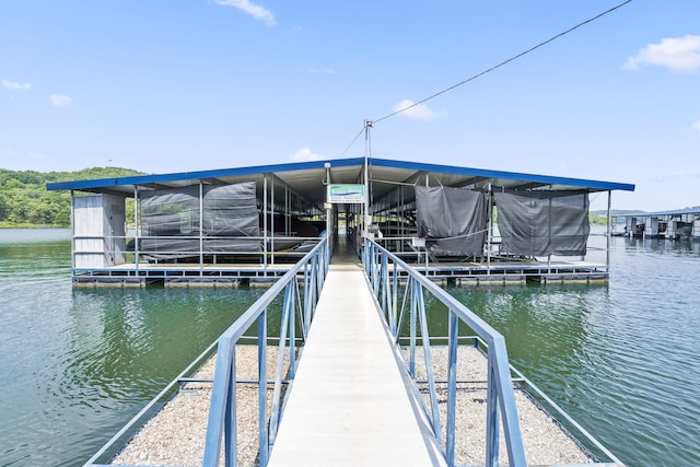 view of dock with a water view