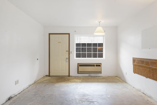 unfurnished living room with heating unit