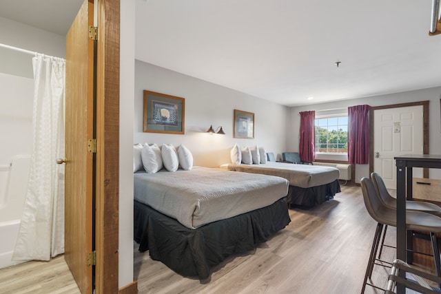 bedroom featuring light hardwood / wood-style floors